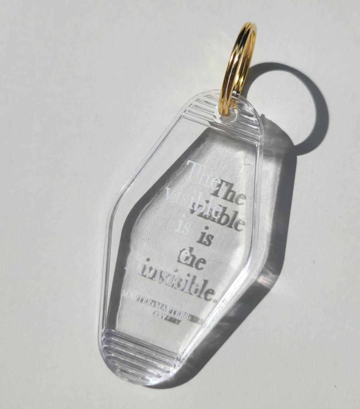 Keyring • Transparent • The visible is the invisible.